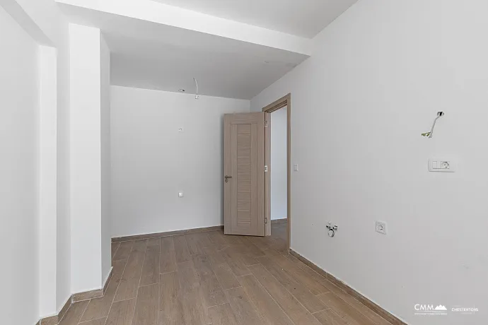 Apartment in Rafailovići, with a total area of 127 m² plus a 13 m² terrace.